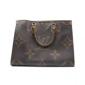 Brown Louis Vuitton tote bag with monogram pattern and leather handles, on white background.