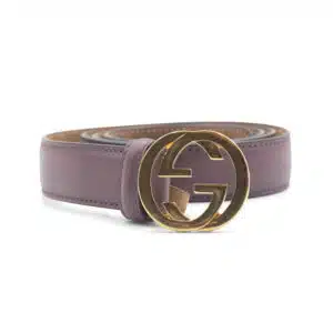 A mauve leather belt with a large gold double G Gucci logo buckle.