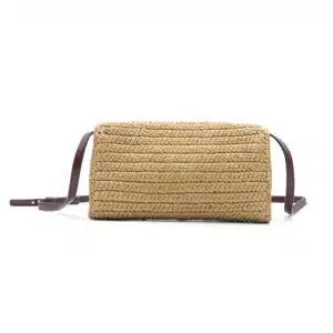 Rectangular woven straw crossbody bag with brown leather strap, shown on a white background.